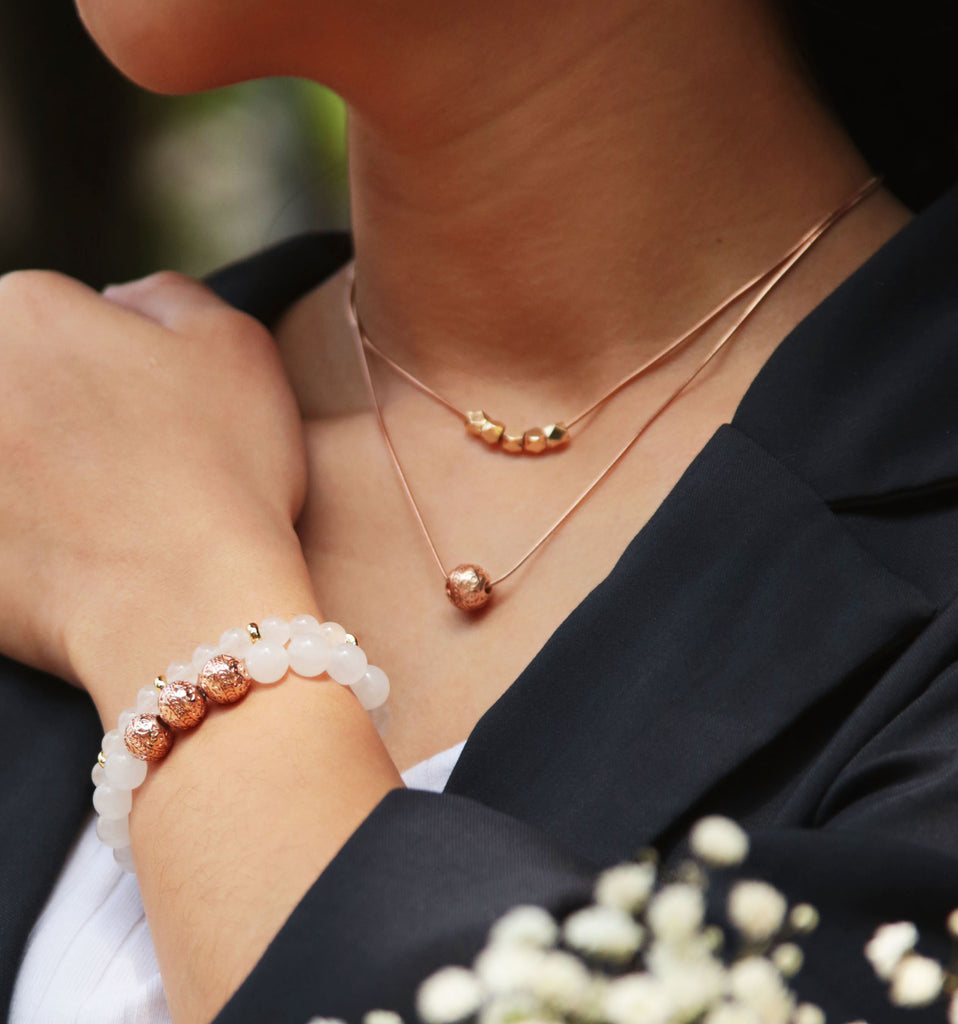 Five tips for layering necklaces like a pro